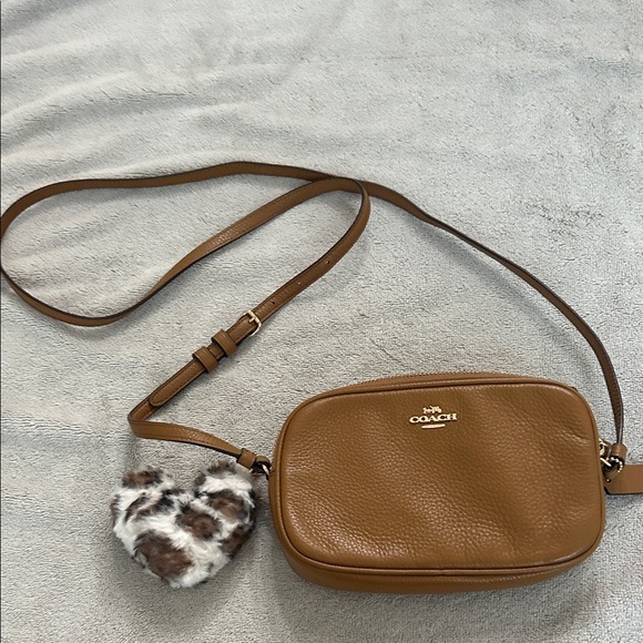 Coach Handbags - Coach Tan Pebbled Leather Crossbody Bag with Heart Charm